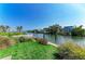 Scenic waterfront view showcasing lush landscaping, neighboring homes, and a peaceful waterway at 511 Loquat Dr, Anna Maria, FL 34216