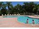 Community pool offers a place to relax and cool off with ample space for swimming and lounging at 5168 Northridge Rd # 102, Sarasota, FL 34238