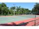 Enjoy a game of tennis on the community's well-maintained tennis court surrounded by lush landscaping at 5168 Northridge Rd # 102, Sarasota, FL 34238