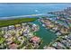 Waterfront real estate surrounded by scenic canals, multiple docks, and beautiful landscaping at 520 Harbor Cay Dr, Longboat Key, FL 34228