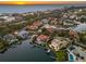 This waterfront residence offers beautiful views, a private pool, and boat access at 520 Harbor Cay Dr, Longboat Key, FL 34228
