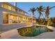 Stunning backyard with a pool reflecting the home's architecture, perfect for outdoor living at 520 Harbor Cay Dr, Longboat Key, FL 34228