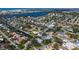Beautiful aerial view of waterfront community with canals, homes with pools, docks and access to bay and ocean at 6136 Hollywood Blvd, Sarasota, FL 34231