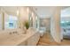 Luxurious bathroom features double vanity, soaking tub, and walk-in shower at 6136 Hollywood Blvd, Sarasota, FL 34231