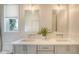 Modern bathroom with dual sinks, quartz countertop, and stylish fixtures at 6136 Hollywood Blvd, Sarasota, FL 34231