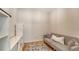 Versatile bonus room with comfortable sofa and stylish shelving, perfect for relaxing at 6136 Hollywood Blvd, Sarasota, FL 34231