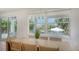 Bright dining room features modern light fixtures and water views at 6136 Hollywood Blvd, Sarasota, FL 34231