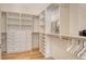 Organized walk-in closet with custom shelving and ample storage space at 6136 Hollywood Blvd, Sarasota, FL 34231