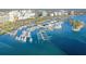 High angle aerial view of a large marina filled with a variety of boats and yachts at 650 Golden Gate Pt # 602, Sarasota, FL 34236