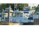 Luxury boats docked in a marina, offering waterfront access and boating opportunities at 650 Golden Gate Pt # 602, Sarasota, FL 34236