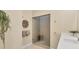 Bathroom with sleek vanity, a glass shower, and decorative accents at 6512 Midnight Pass Rd # 504, Sarasota, FL 34242