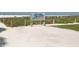 Entrance to Siesta Beach, featuring soft white sand and a welcoming sign at 6512 Midnight Pass Rd # 504, Sarasota, FL 34242