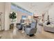 Bright, open living space featuring modern decor, plush seating, and expansive windows at 6512 Midnight Pass Rd # 504, Sarasota, FL 34242