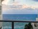 Beautiful ocean view from a balcony overlooking the clear, blue water at 6512 Midnight Pass Rd # 504, Sarasota, FL 34242