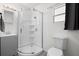 Bathroom featuring a glass enclosed shower, a sink with vanity, and toilet at 6520 Clemson St, Bradenton, FL 34207