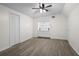 Bright bedroom with built-in shelves and ample closet space, creating an organized area at 6520 Clemson St, Bradenton, FL 34207