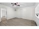 Simple bedroom with ample closet space and a ceiling fan, ideal for comfortable living at 6520 Clemson St, Bradenton, FL 34207