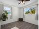 Inviting bedroom with natural light, neutral paint, and hardwood floors at 6520 Clemson St, Bradenton, FL 34207