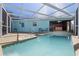 Inviting screened pool with an attached spa area and ample deck space for entertaining and relaxation at 6520 Clemson St, Bradenton, FL 34207