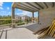 Unfinished balcony view with a concrete floor and views of adjacent homes at 6924 Bochi Cir, Sarasota, FL 34242