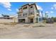 Exterior view of a home under construction, complemented by 'La Linda' signage at 6924 Bochi Cir, Sarasota, FL 34242