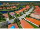 Aerial view of a community that features waterfront properties and mature landscaping at 708 Foggy Morn Ln, Bradenton, FL 34212