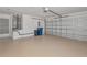 Well-lit garage with a large door, room for storage, and access to the home at 708 Foggy Morn Ln, Bradenton, FL 34212