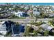 An aerial view showing the home's proximity to the beach at 7701 Palm Dr, Holmes Beach, FL 34217