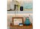Elegant shelving decor in the kitchen, featuring decor, art, and glass wear at 7701 Palm Dr, Holmes Beach, FL 34217