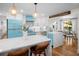 Charming kitchen with modern appliances and a cozy dining area at 7701 Palm Dr, Holmes Beach, FL 34217