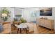 Bright living room featuring contemporary furnishings and a calming color palette at 7701 Palm Dr, Holmes Beach, FL 34217