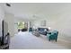 Spacious living room with a plush carpet, and plenty of natural light at 8211 Summer Greens Ter, Bradenton, FL 34212