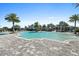 Large community pool with ample seating and lush landscaping at 8227 Nevis Run, Bradenton, FL 34202