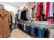 Spacious walk-in closet with organized shelving and hanging space for ample storage at 8227 Nevis Run, Bradenton, FL 34202