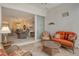Comfortable lanai setting that offers a tranquil view into the home's elegant living area at 9411 Forest Hills Cir, Sarasota, FL 34238