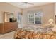 Comfortable primary bedroom with a sliding door to the outside patio and light-filtering window shades at 9411 Forest Hills Cir, Sarasota, FL 34238