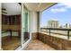 Balcony view from office slider, featuring city views and tile floor at 988 Blvd Of The Arts # 1209, Sarasota, FL 34236