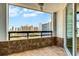 This condo balcony offers city views and a great outdoor space for relaxing or enjoying your morning coffee at 988 Blvd Of The Arts # 1209, Sarasota, FL 34236