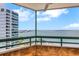 Enjoy breathtaking bay views from this condo balcony, perfect for relaxing and entertaining outdoors at 988 Blvd Of The Arts # 1209, Sarasota, FL 34236