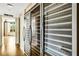 Hallway showcasing several large, temperature-controlled wine coolers, perfect for wine enthusiasts and collectors at 988 Blvd Of The Arts # 1209, Sarasota, FL 34236