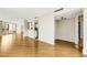 Spacious open floor plan, with wood floors, living, dining and kitchen areas at 988 Blvd Of The Arts # 1209, Sarasota, FL 34236