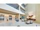 Open-concept lobby featuring high ceilings, comfortable seating, and contemporary decor for a luxurious feel at 988 Blvd Of The Arts # 1209, Sarasota, FL 34236