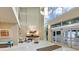 Inviting lobby with modern decor, comfortable seating, and a view of the water at 988 Blvd Of The Arts # 1209, Sarasota, FL 34236