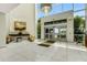 Spacious and modern lobby with high ceilings, floor-to-ceiling windows, and stylish decor at 988 Blvd Of The Arts # 1209, Sarasota, FL 34236