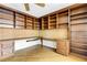 Study with built-in desk and shelving, ample space for storage and productivity at 988 Blvd Of The Arts # 1209, Sarasota, FL 34236