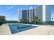 Enjoy a game on this community tennis court, perfect for active living with lush landscaping nearby at 988 Blvd Of The Arts # 1209, Sarasota, FL 34236