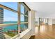 Beautiful waterfront view from a high-rise apartment showing a marina, a bridge, and the city skyline at 988 Blvd Of The Arts # 1209, Sarasota, FL 34236