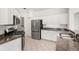 Kitchen with white cabinets, stainless steel appliances, and granite countertops at 11019 Water Lily Way, Lakewood Ranch, FL 34202