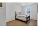 Bedroom with tile flooring, natural light, and ceiling fan at 115 64Th E Ave, Bradenton, FL 34203