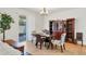 Dining area featuring a dining table and sliding glass door at 115 64Th E Ave, Bradenton, FL 34203